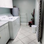 Laundry Room With Full Size Washer/Dryer